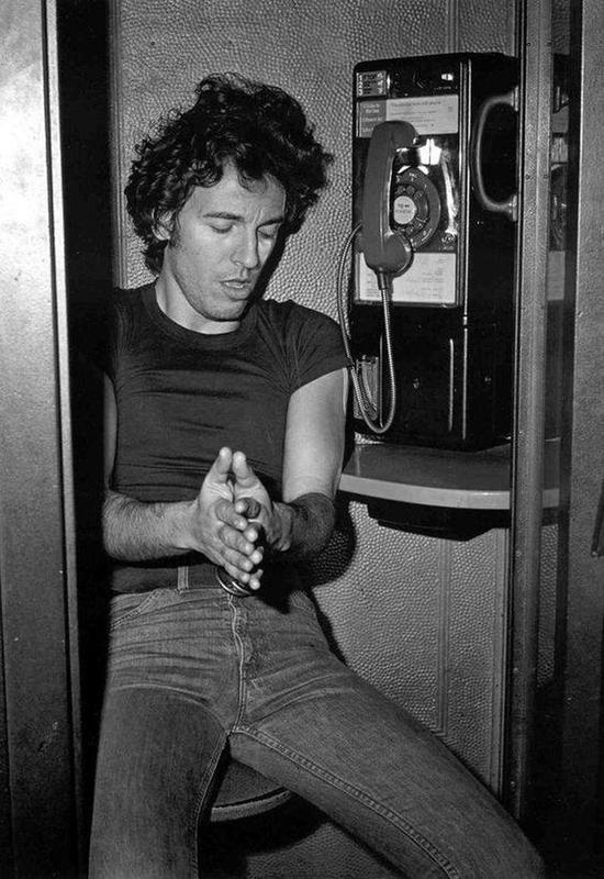 Bruce Springsteen in a phone booth, East Camden, NJ, 1978 32