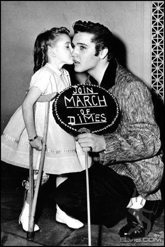Elvis posing with Joanne Wilson, a polio child for March of Dimes - 1950s 40