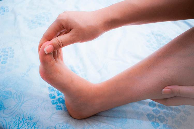 #5. Painful or Numb Feet and Legs