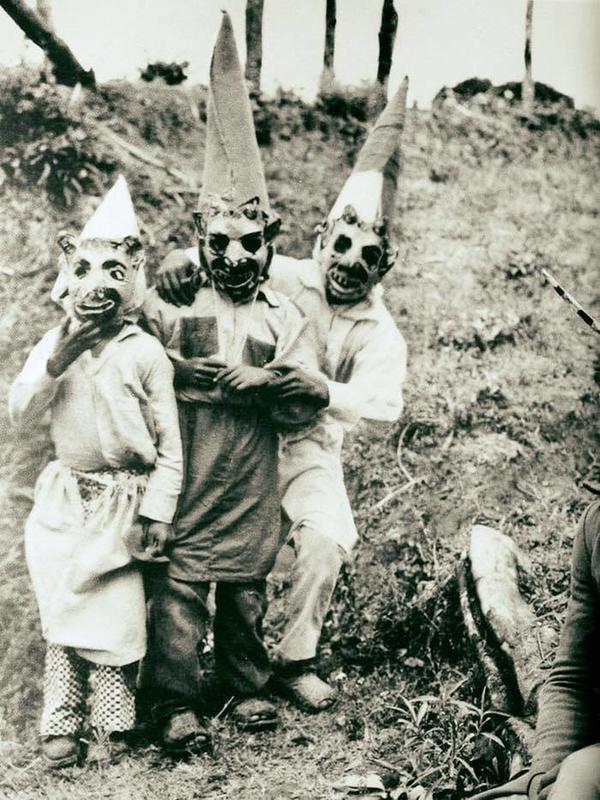 A 100-year-old Halloween photo with creepy costumes. Wow!