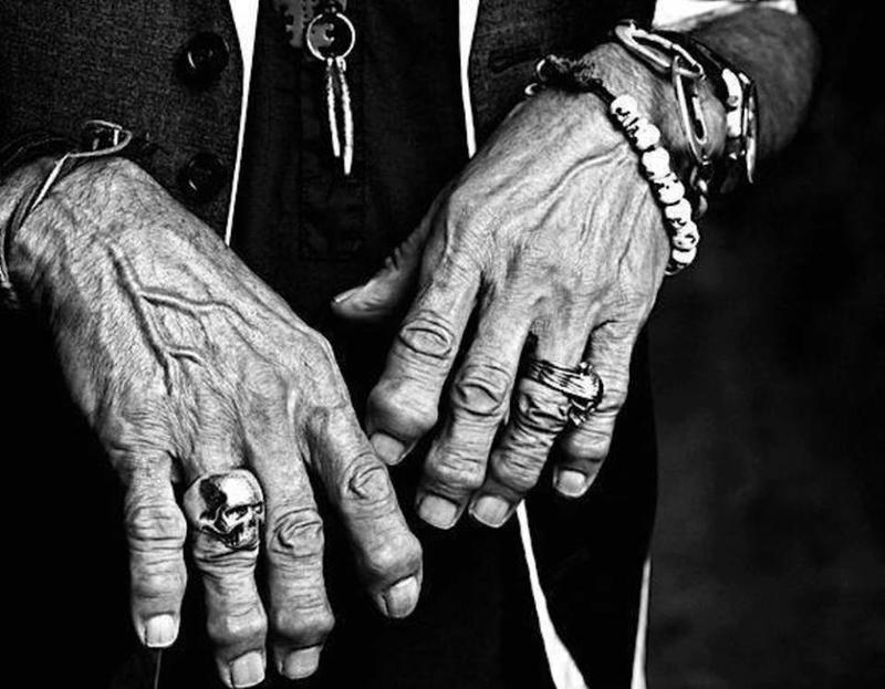 These hands could tell a few stories. Easy to recognize them if you're a fan.