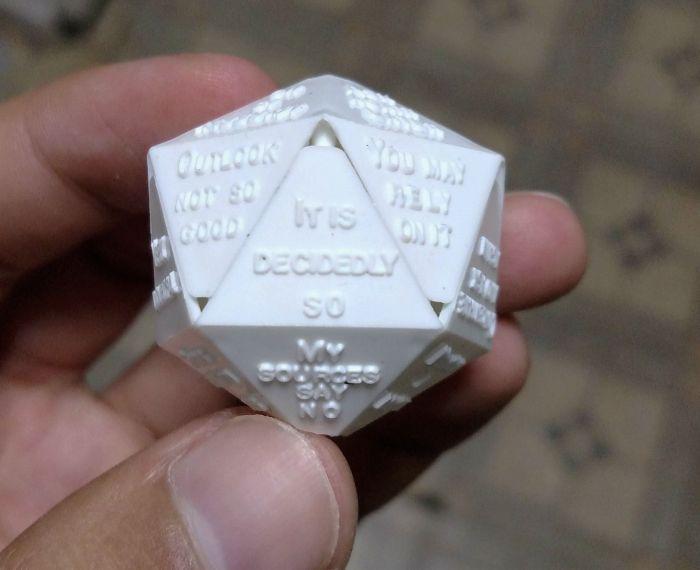 The Die From The Inside Of A Magic 8 Ball.